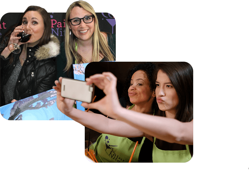 Women enjoying Paint Nite wine and paint party, friends taking selfie in Paint Nite aprons